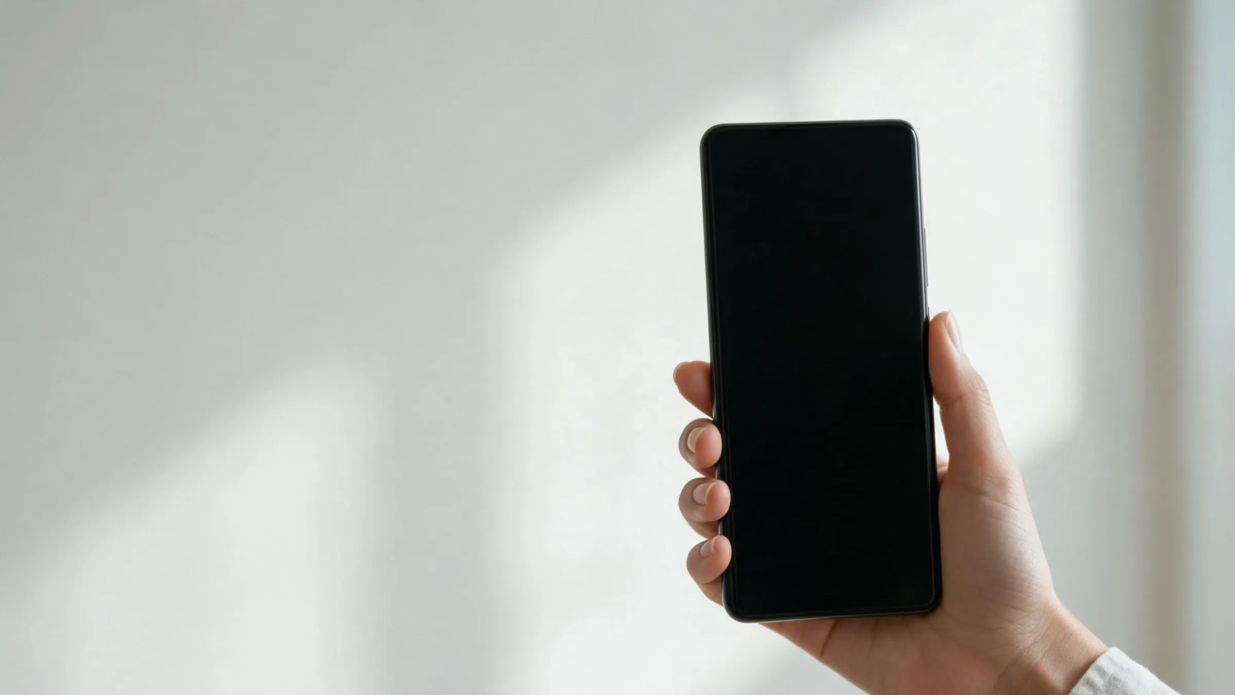 A hand holding a phone showing an incoming QuorumVoice call